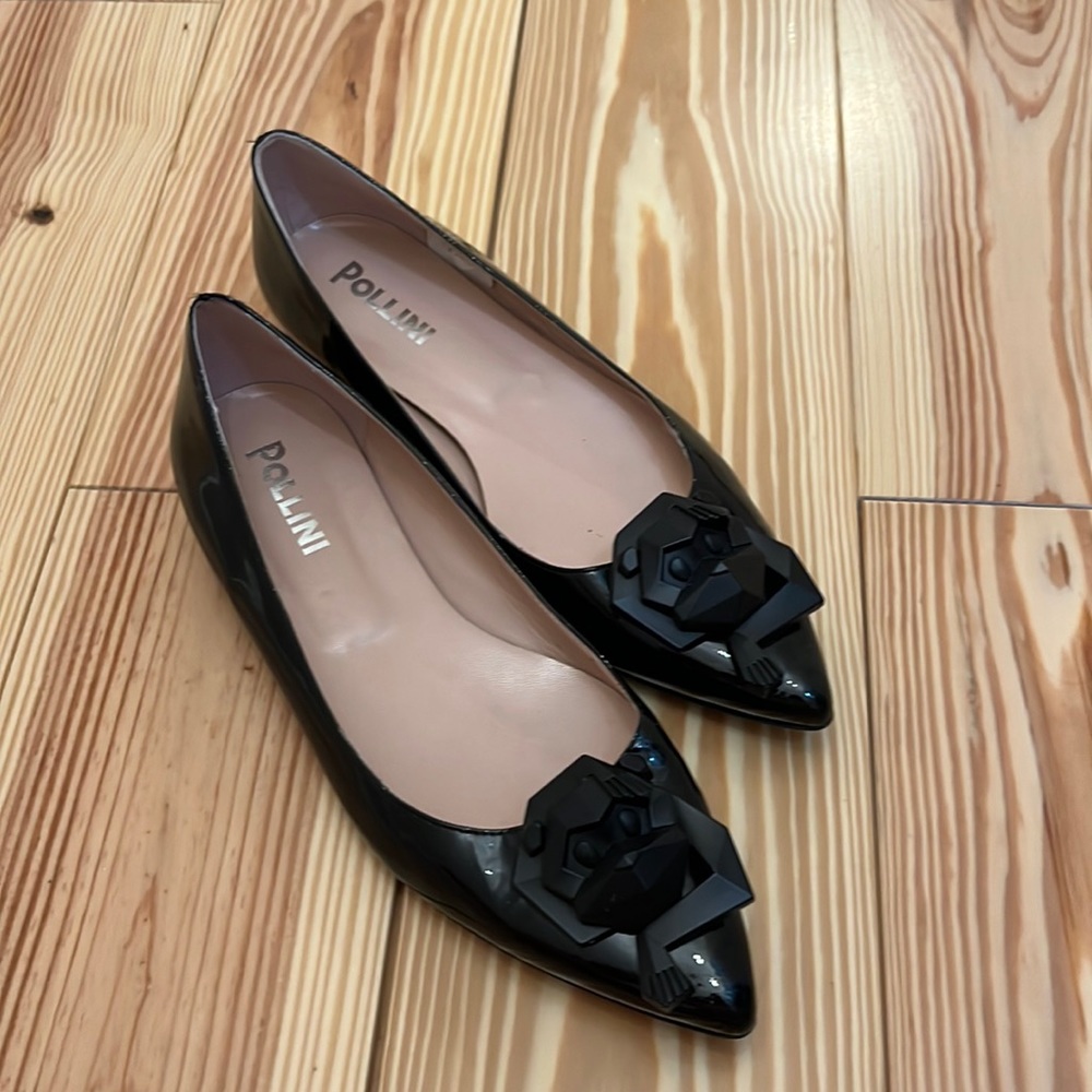 Pollini limited edition black patent monkey emblem flats 37